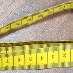 measuring tape to determine body sizes