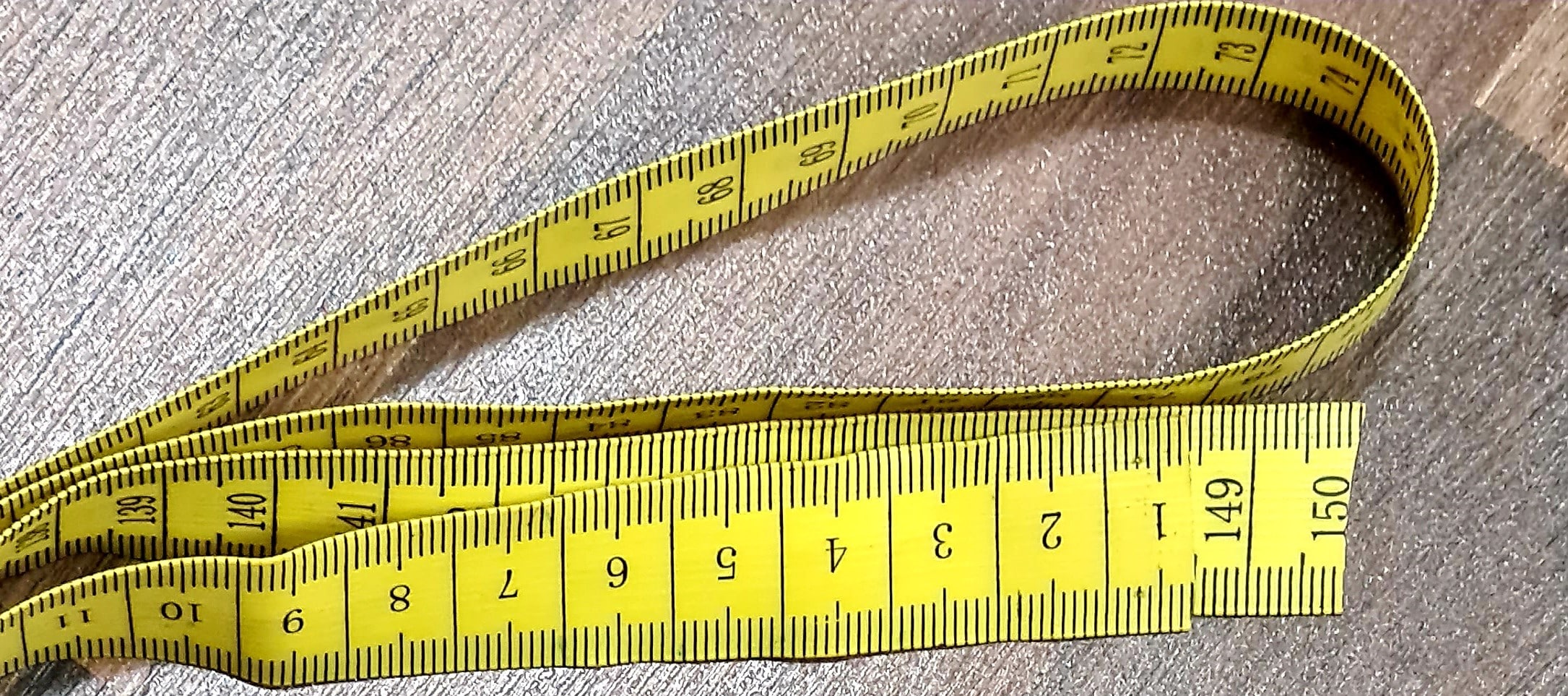 measuring tape to determine body sizes